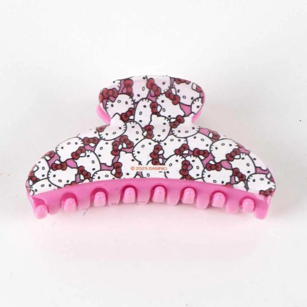 Mollette fermacapelli rosa decorata con personaggi Hello Kitty su sfondo bianco, accessorio Nerdscape.