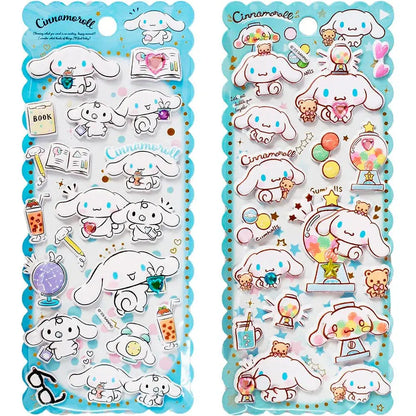Adesivi Cinnamoroll kawaii su sfondo blu, ideali per fan e collezionisti Nerdscape.