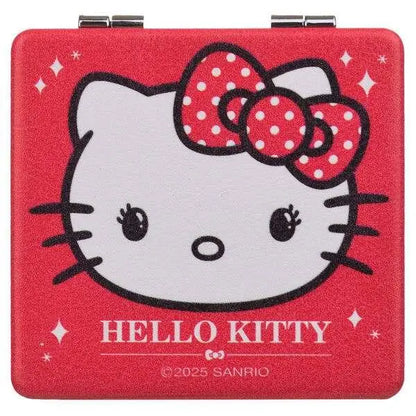 Scatola rossa Nerdscape con illustrazione di Hello Kitty e fiocco a pois bianchi.
