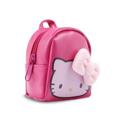 Mini zaino rosa con personaggio stampato e fiocco, accessorio Nerdscape per appassionati geek.