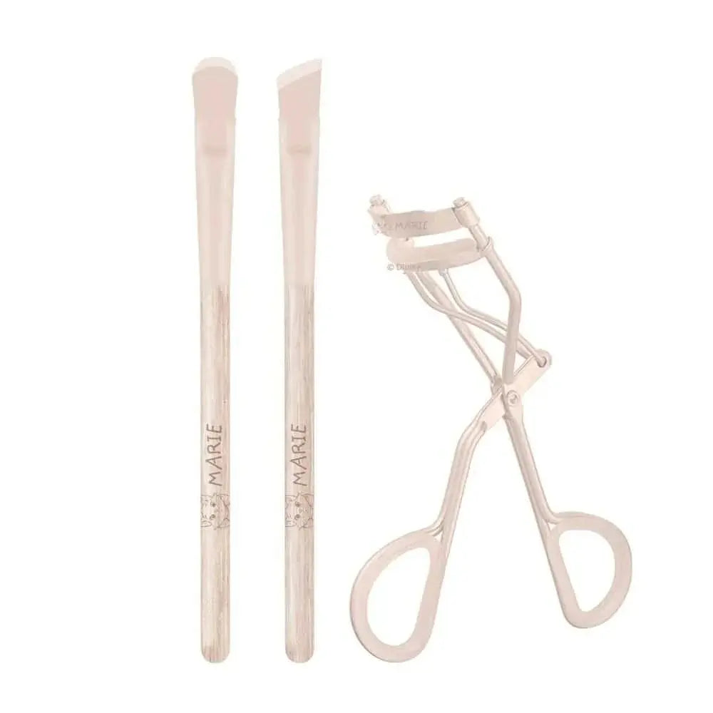 Set trucco Disney Marie con due pennelli beige e piegaciglia, accessori make-up Nerdscape.