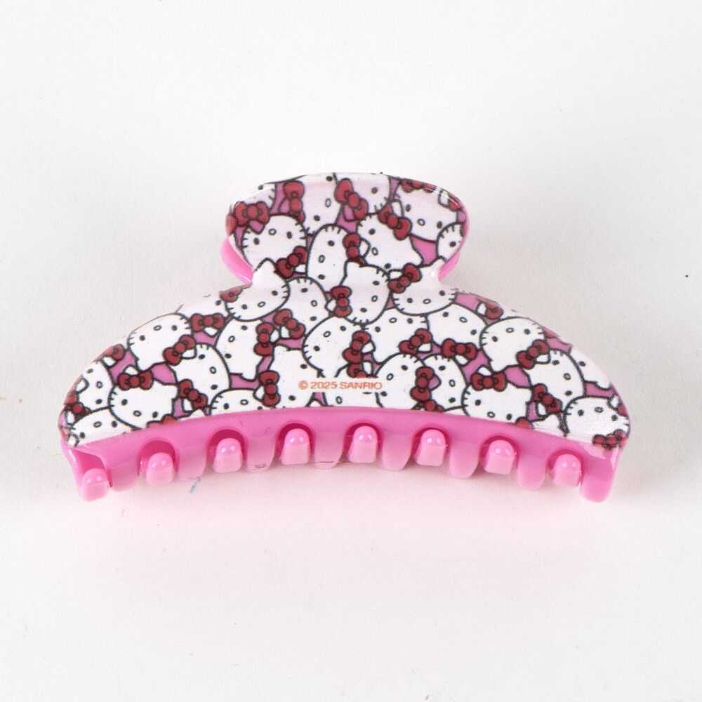 Mollette fermacapelli rosa decorata con personaggi Hello Kitty su sfondo bianco, accessorio Nerdscape.
